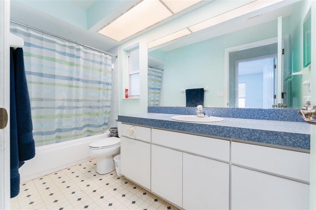 5142 South Louise Point Homosassa, FL 34446 - Photo 38 of 55 a bathroom with a sink a toilet and shower