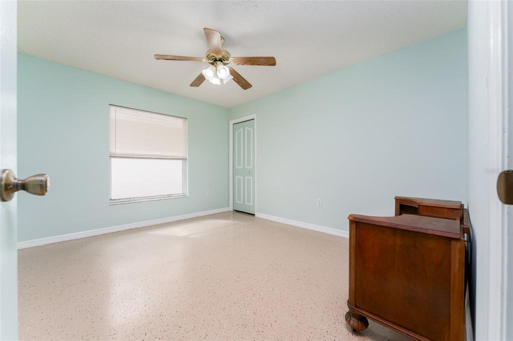 5142 South Louise Point Homosassa, FL 34446 - Photo 39 of 55 an empty room with windows and fan