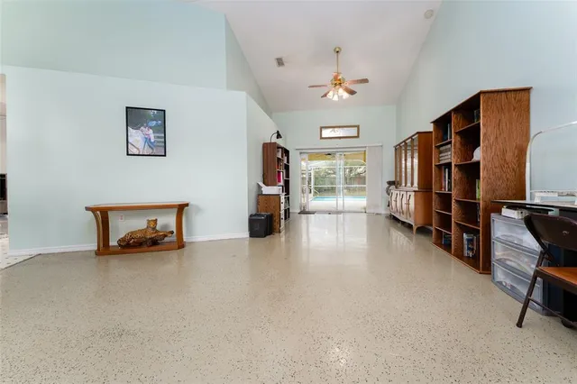 a kitchen with stainless steel appliances a sink a stove a microwave a sink and cabinets