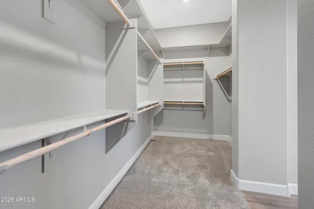 a view of an empty walk in closet