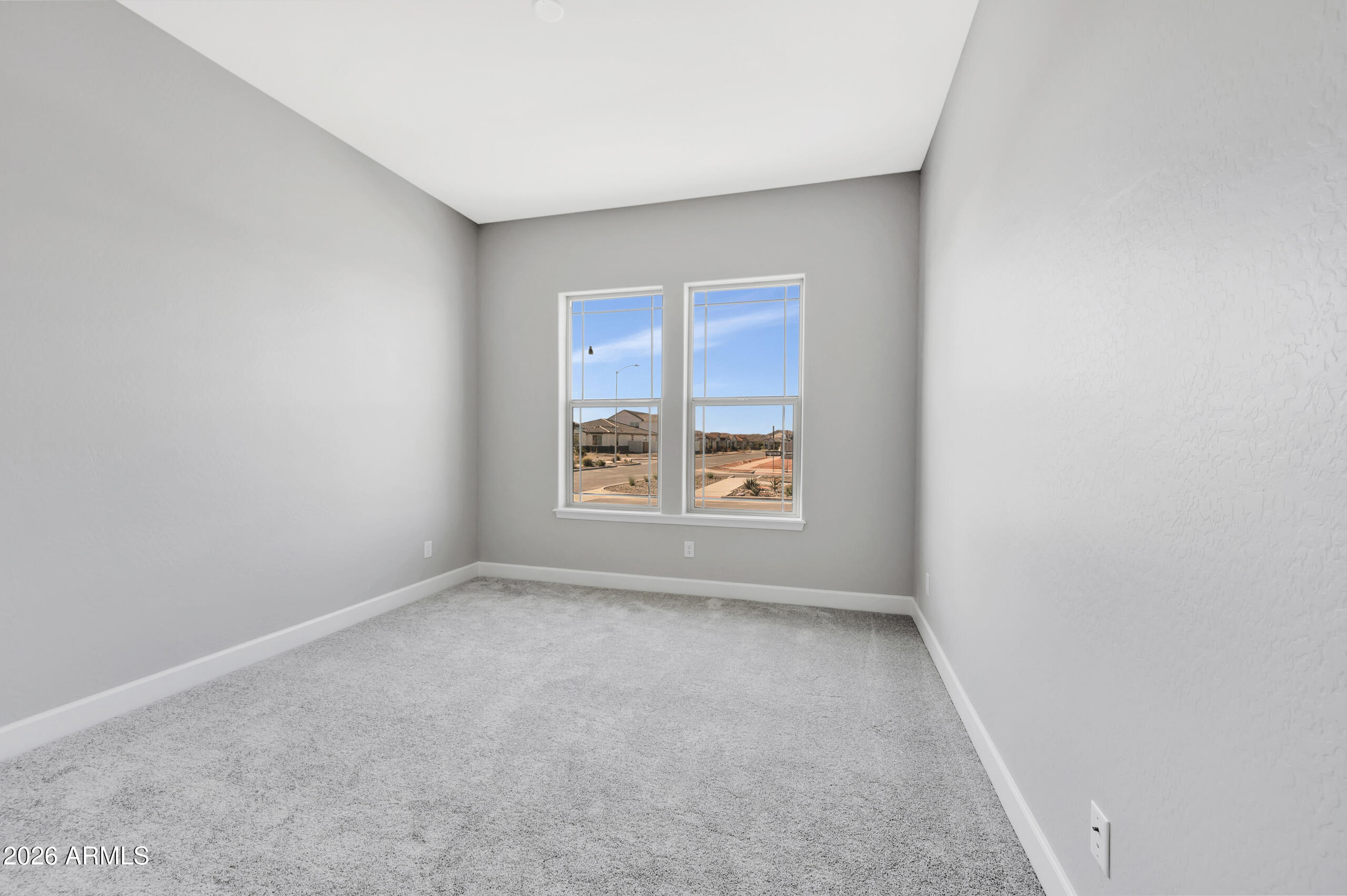 9809 Gold Stone Trail Apache Junction, AZ 85120 - Photo 13 of 23 an empty room with windows