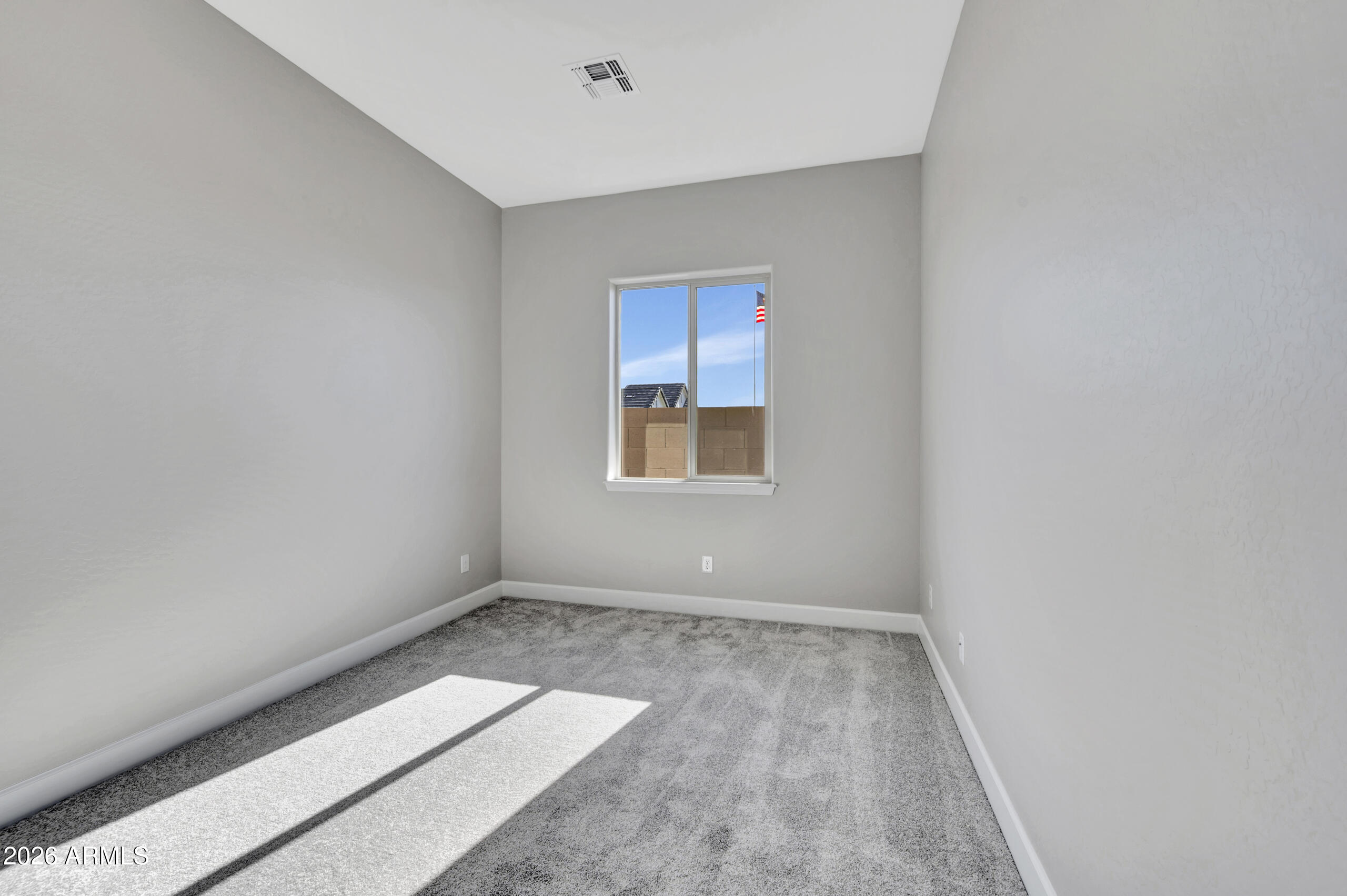 9809 Gold Stone Trail Apache Junction, AZ 85120 - Photo 14 of 23 an empty room with a window