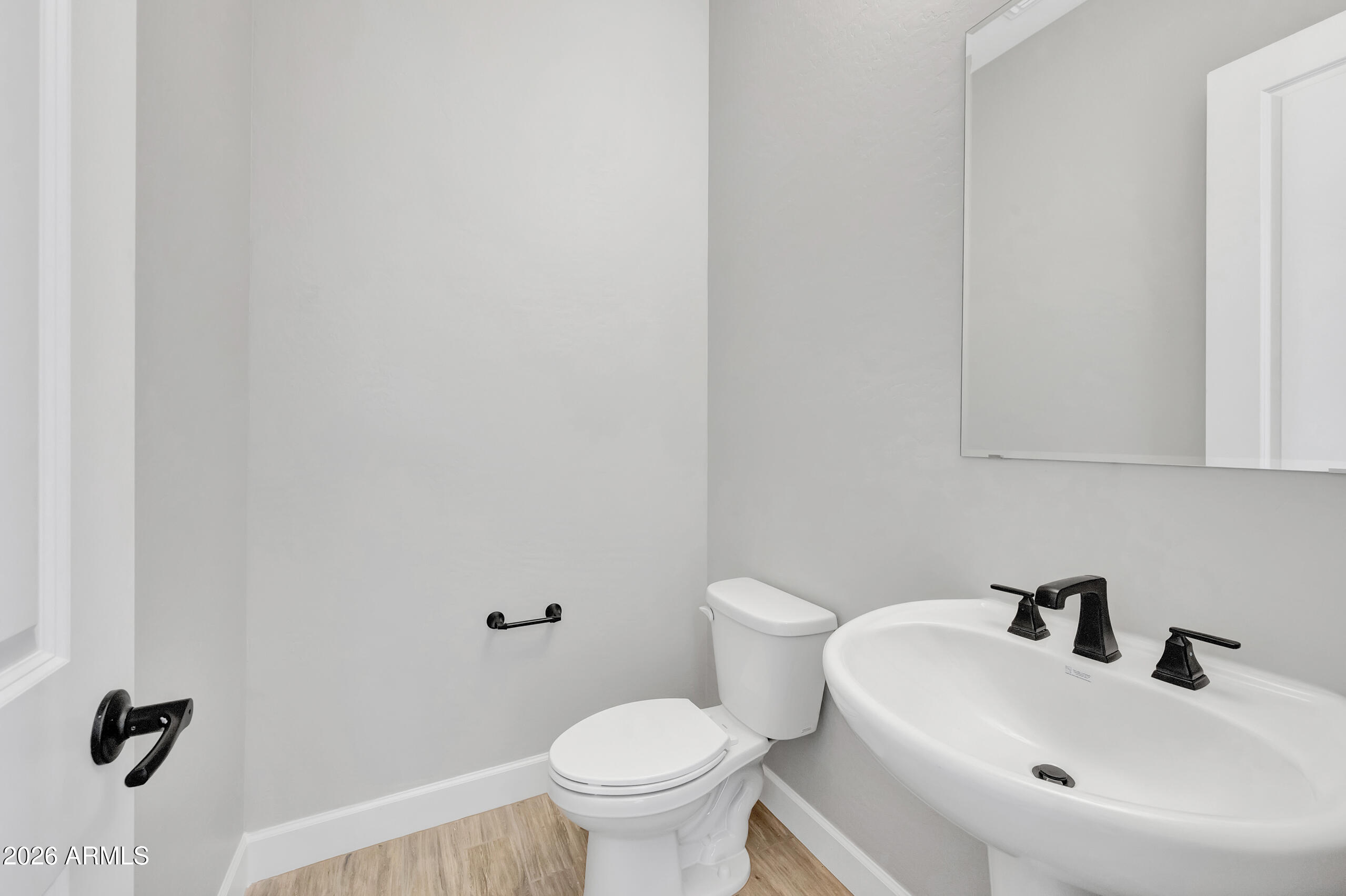 9809 Gold Stone Trail Apache Junction, AZ 85120 - Photo 15 of 23 a bathroom with a sink a toilet and mirror