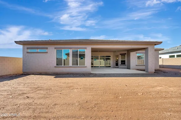 a view of house with yard