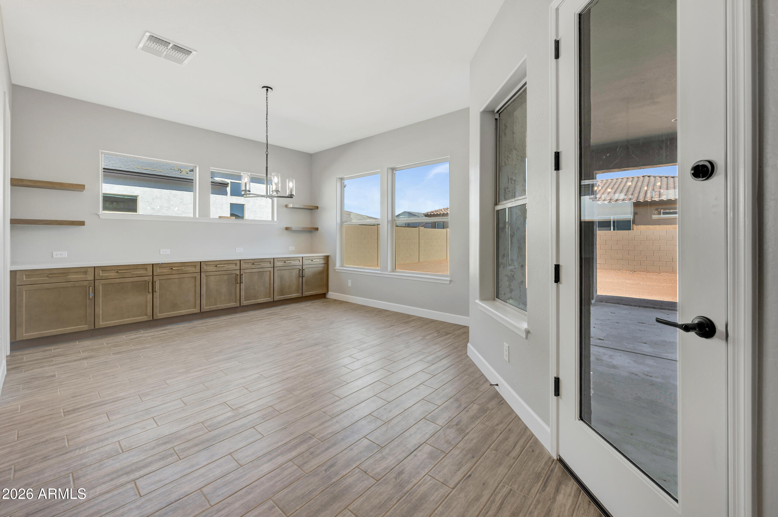 9809 Gold Stone Trail Apache Junction, AZ 85120 - Photo 7 of 23 a view of an empty room and window