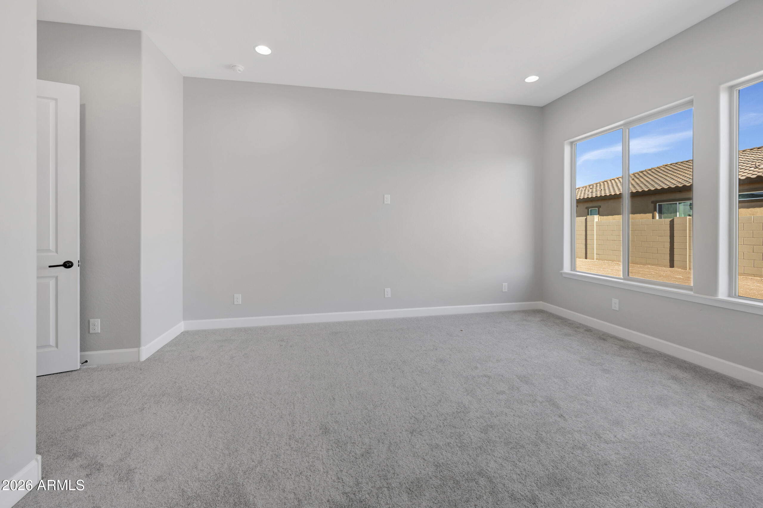 9809 Gold Stone Trail Apache Junction, AZ 85120 - Photo 8 of 23 an empty room with a window