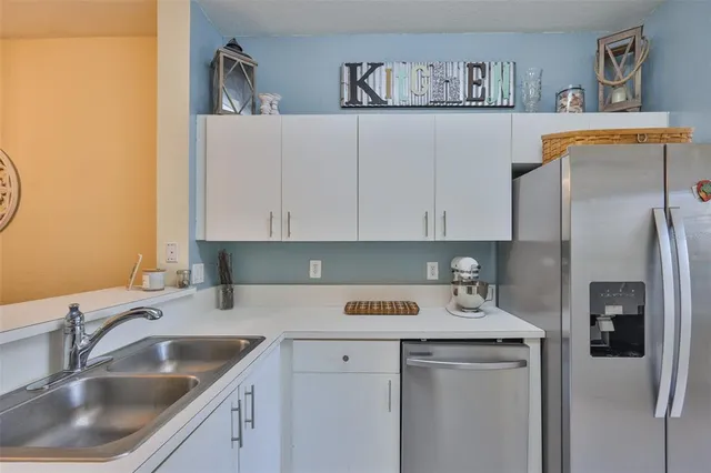 a kitchen with a stove and a microwave