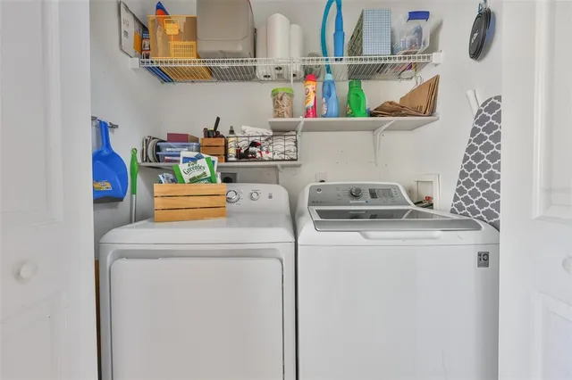 a view of a room with a large window