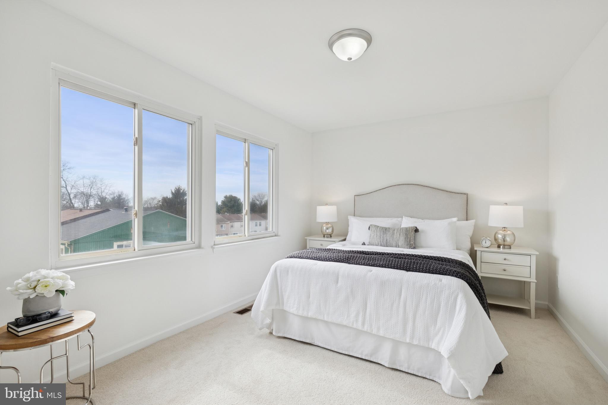 8737 Inquiry Court Walkersville, MD 21793 - Photo 24 of 56 a bedroom with a bed and window