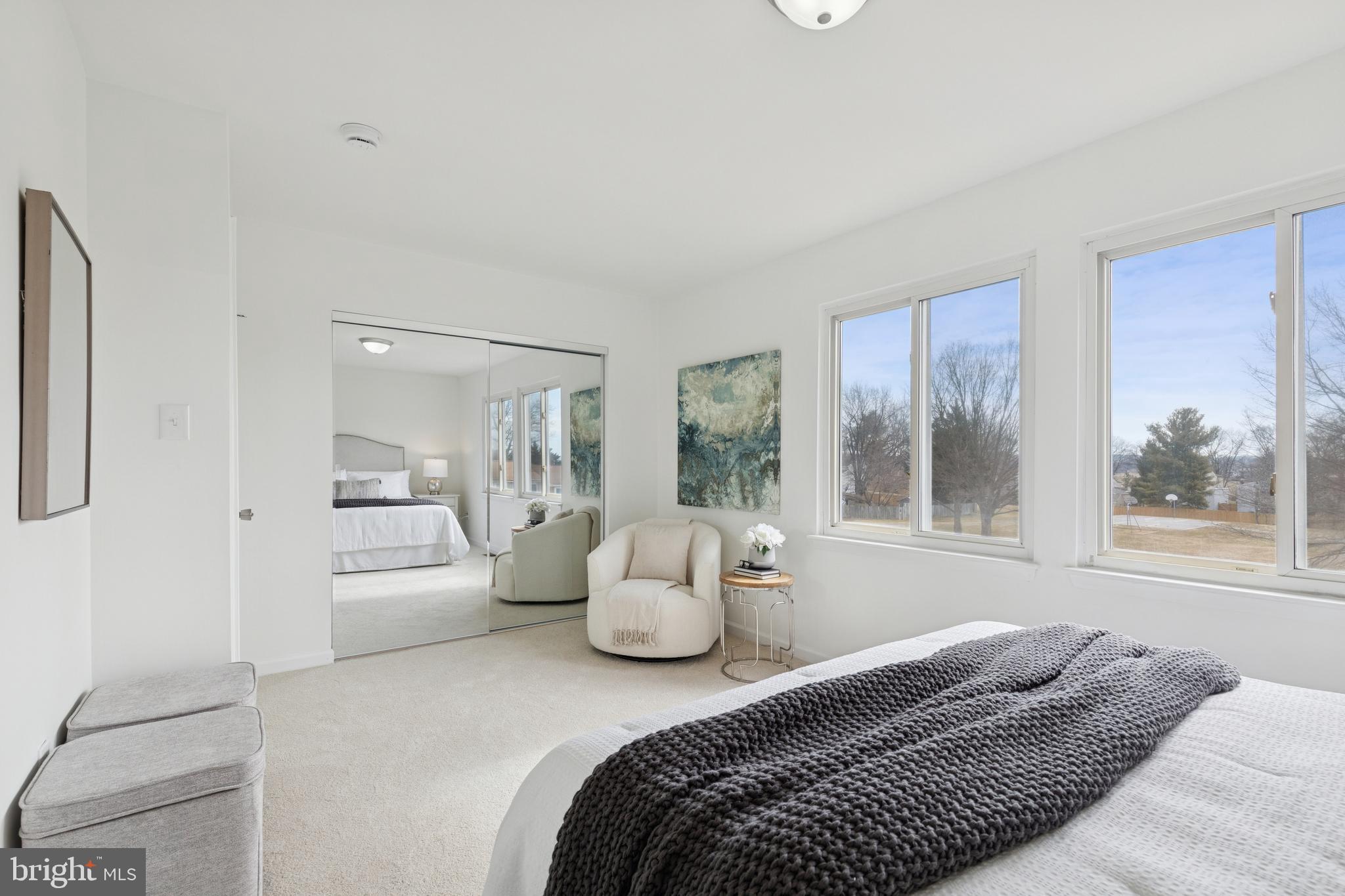 8737 Inquiry Court Walkersville, MD 21793 - Photo 27 of 56 a bedroom with a bed and large windows