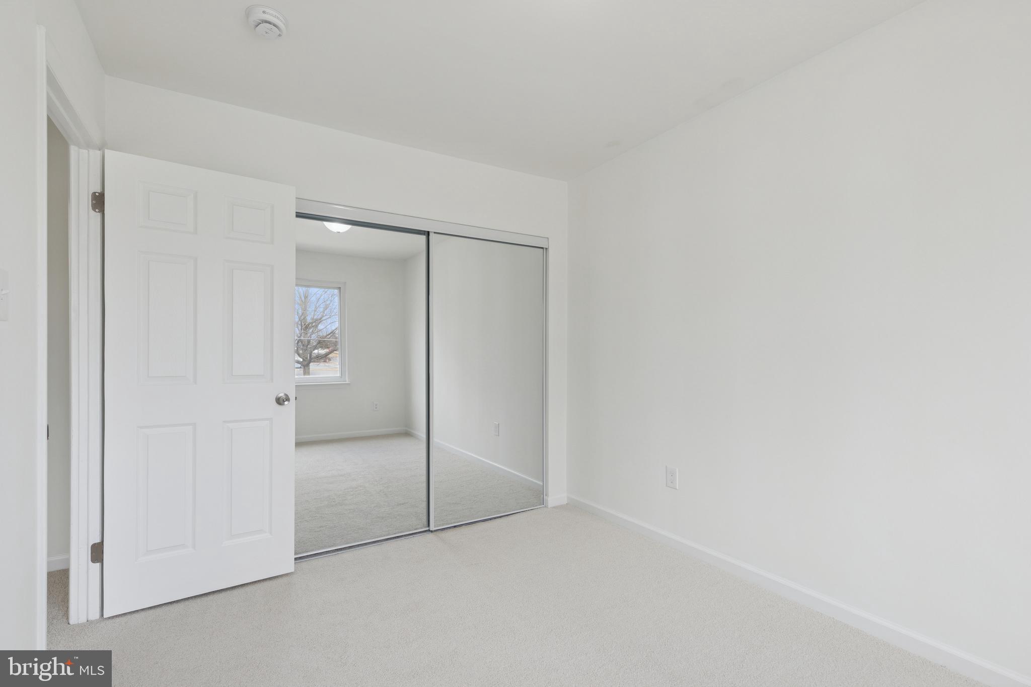 8737 Inquiry Court Walkersville, MD 21793 - Photo 29 of 56 a view of an empty room