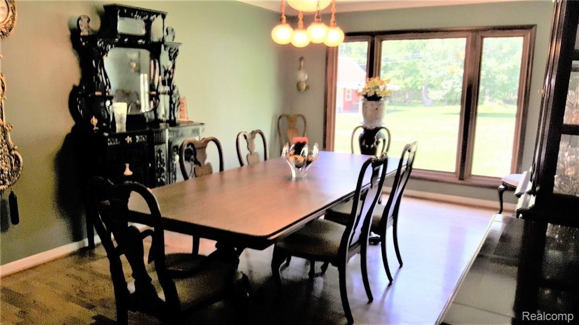 8992 Rucker Road Grosse Ile, MI 48138 - Photo 14 of 40 A very large formal dining room