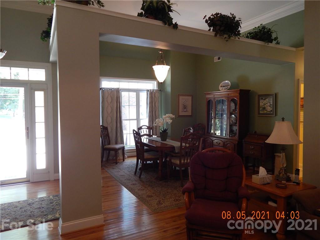 205 South Mccoy Road Salisbury, NC 28144 - Photo 14 of 32 a living room with furniture and a wooden floor