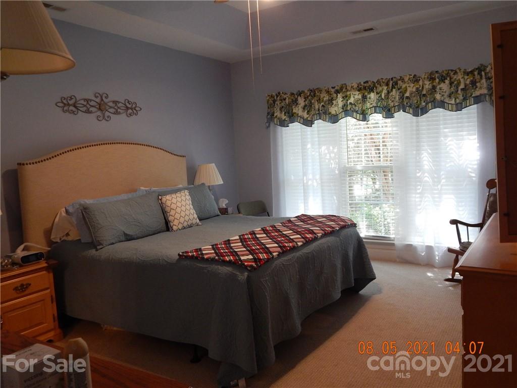 205 South Mccoy Road Salisbury, NC 28144 - Photo 22 of 32 a bedroom with a bed and a window