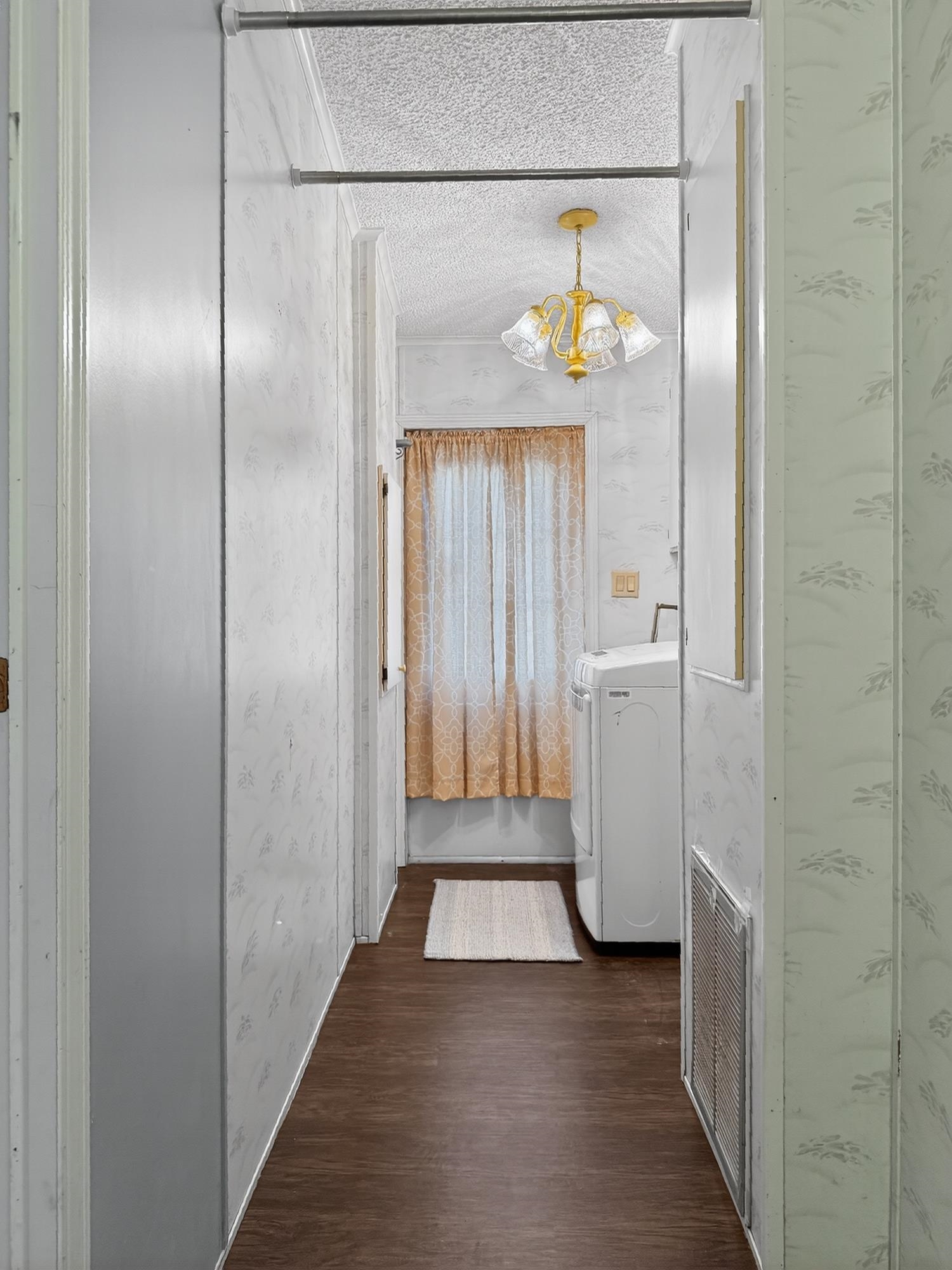 142 Garcia Street Interlachen, FL 32148 - Photo 15 of 28 a view of a hallway with wooden floor