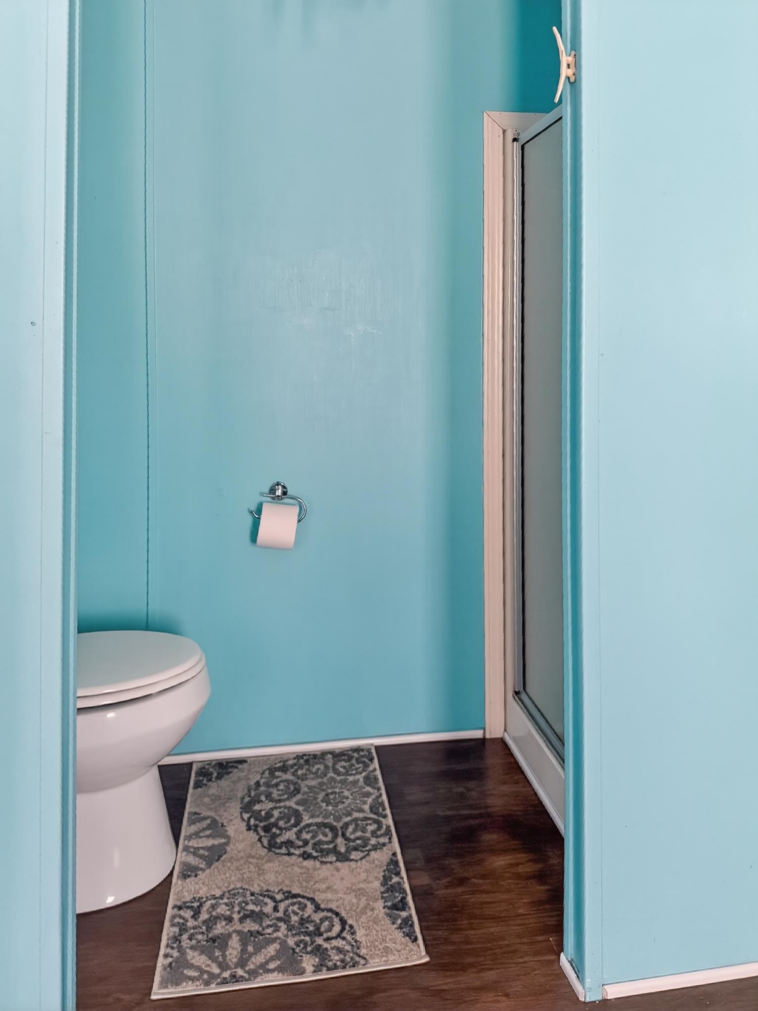 142 Garcia Street Interlachen, FL 32148 - Photo 18 of 28 a bathroom with a toilet and a shower