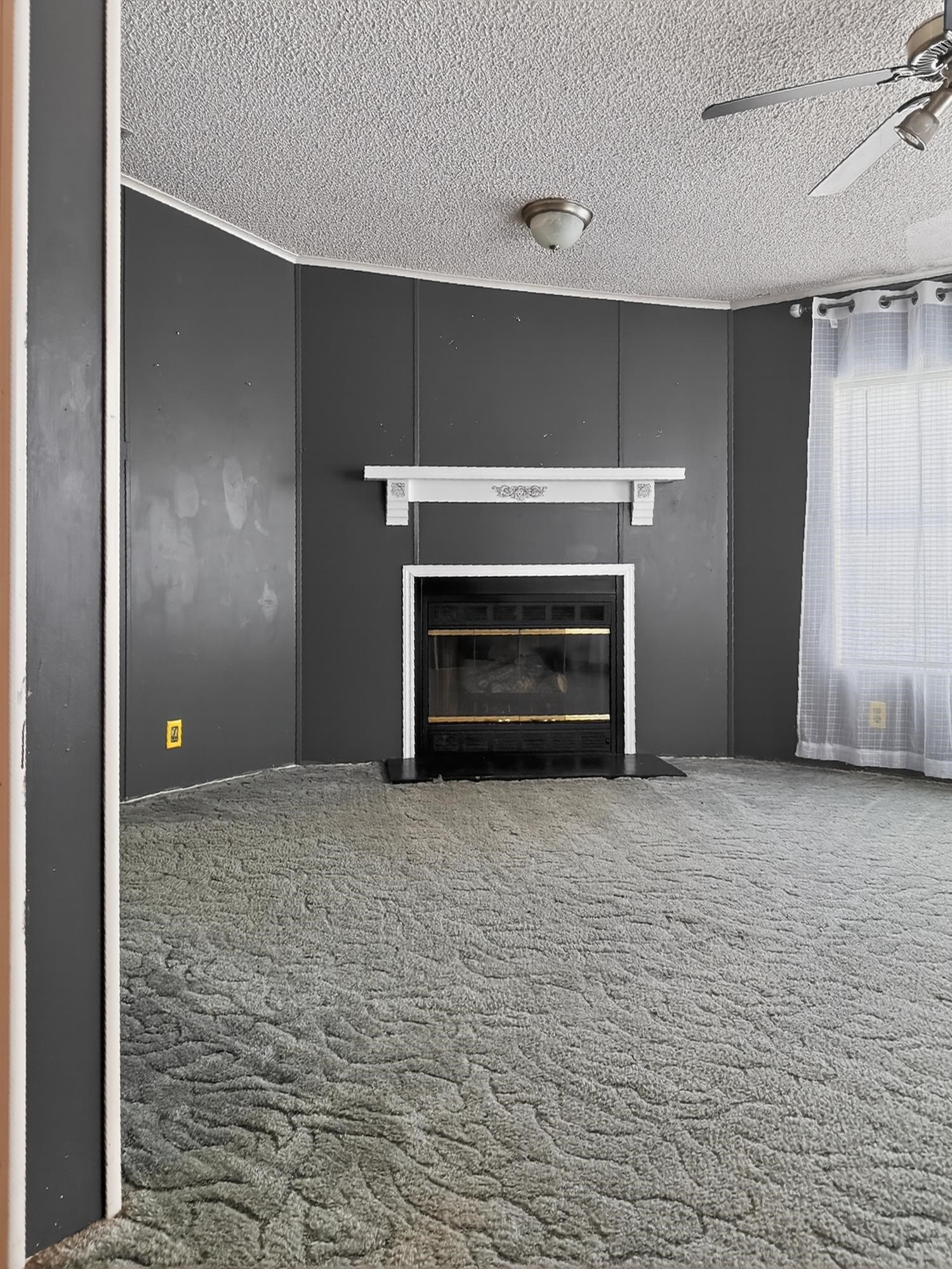 142 Garcia Street Interlachen, FL 32148 - Photo 21 of 28 a view of empty room with a fireplace