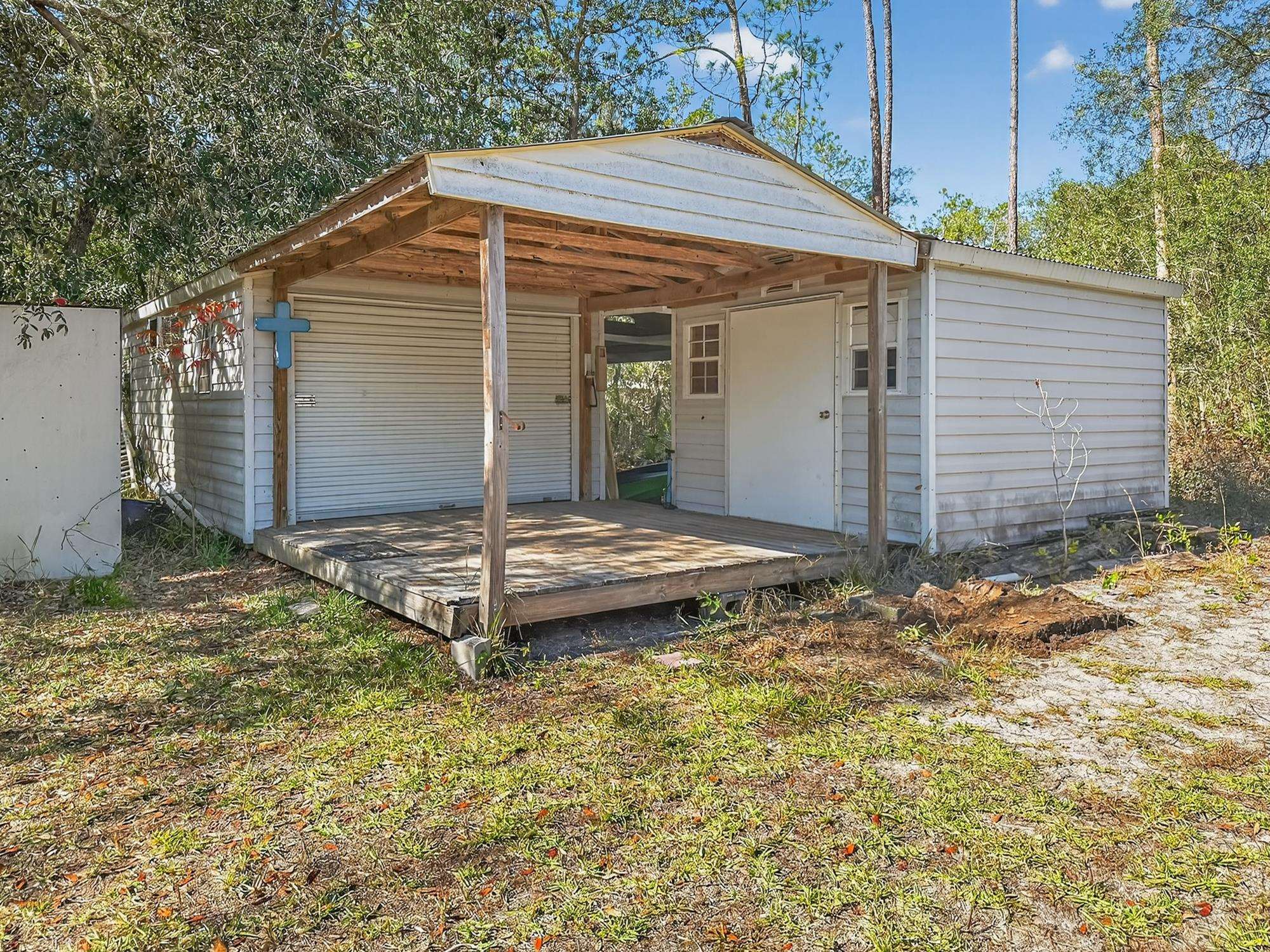 142 Garcia Street Interlachen, FL 32148 - Photo 7 of 28 a view of a house with small yard