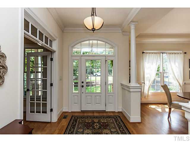 1101 Tacketts Pond Drive Raleigh, NC 27614 - Photo 3 of 25 a view of an entryway with wooden floor