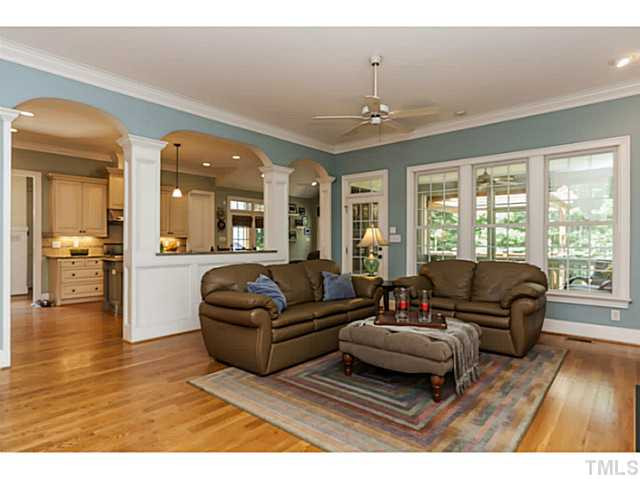 1101 Tacketts Pond Drive Raleigh, NC 27614 - Photo 8 of 25 a living room with furniture and a large window