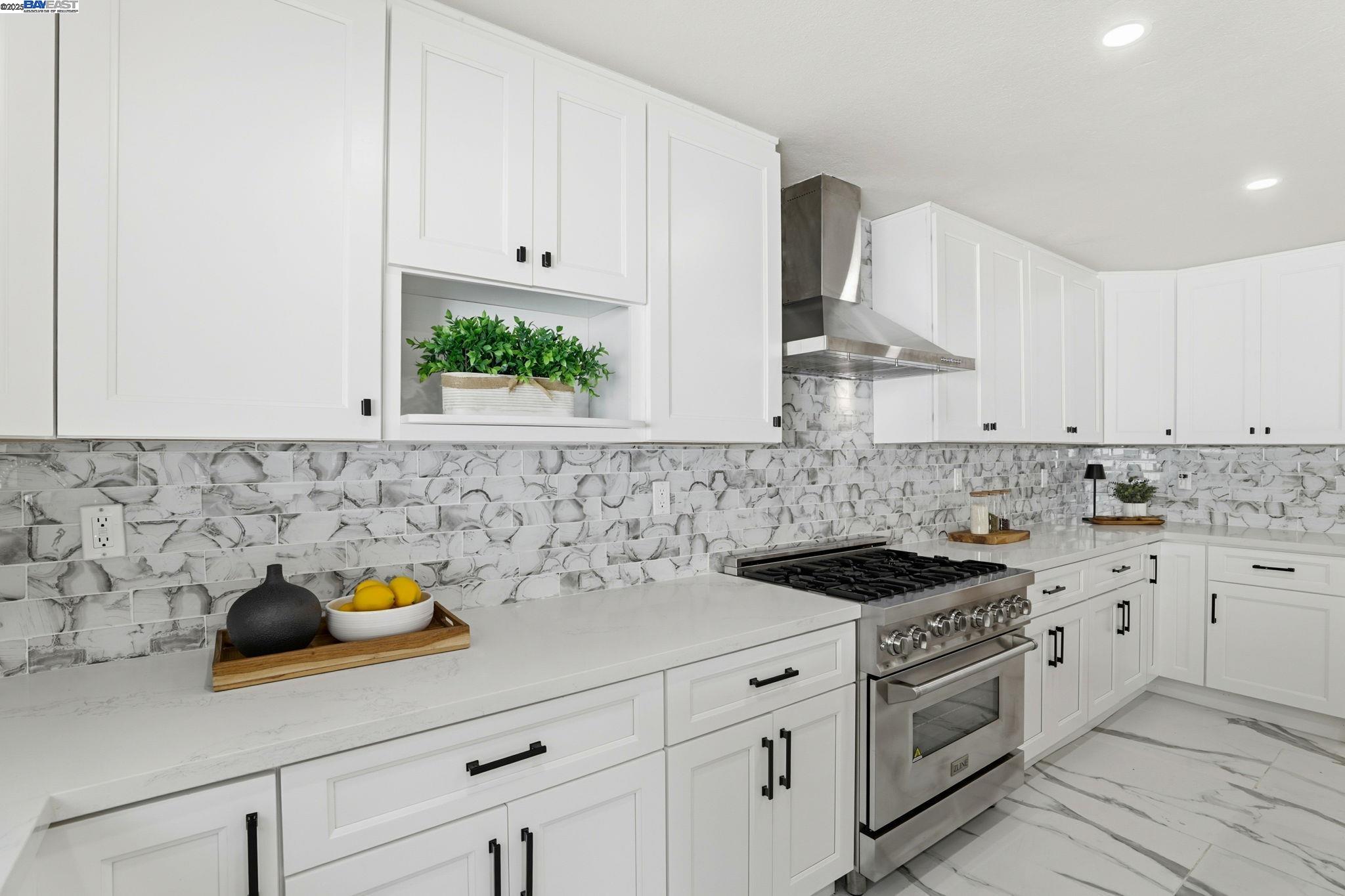 10745 Ridgeview Way San Jose, CA 95127 - Photo 12 of 54 a kitchen with white cabinets and white appliances