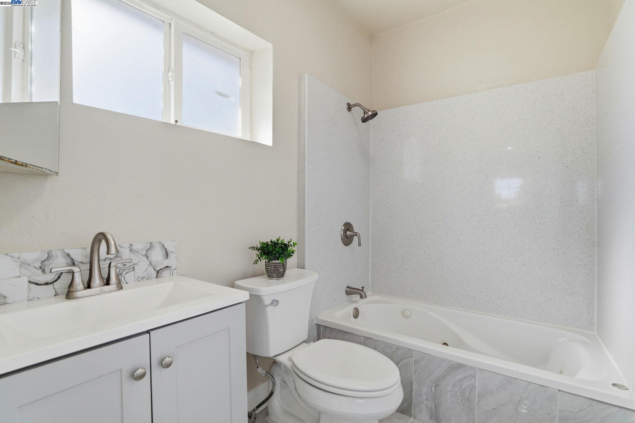 10745 Ridgeview Way San Jose, CA 95127 - Photo 19 of 54 a bathroom with a sink toilet and shower