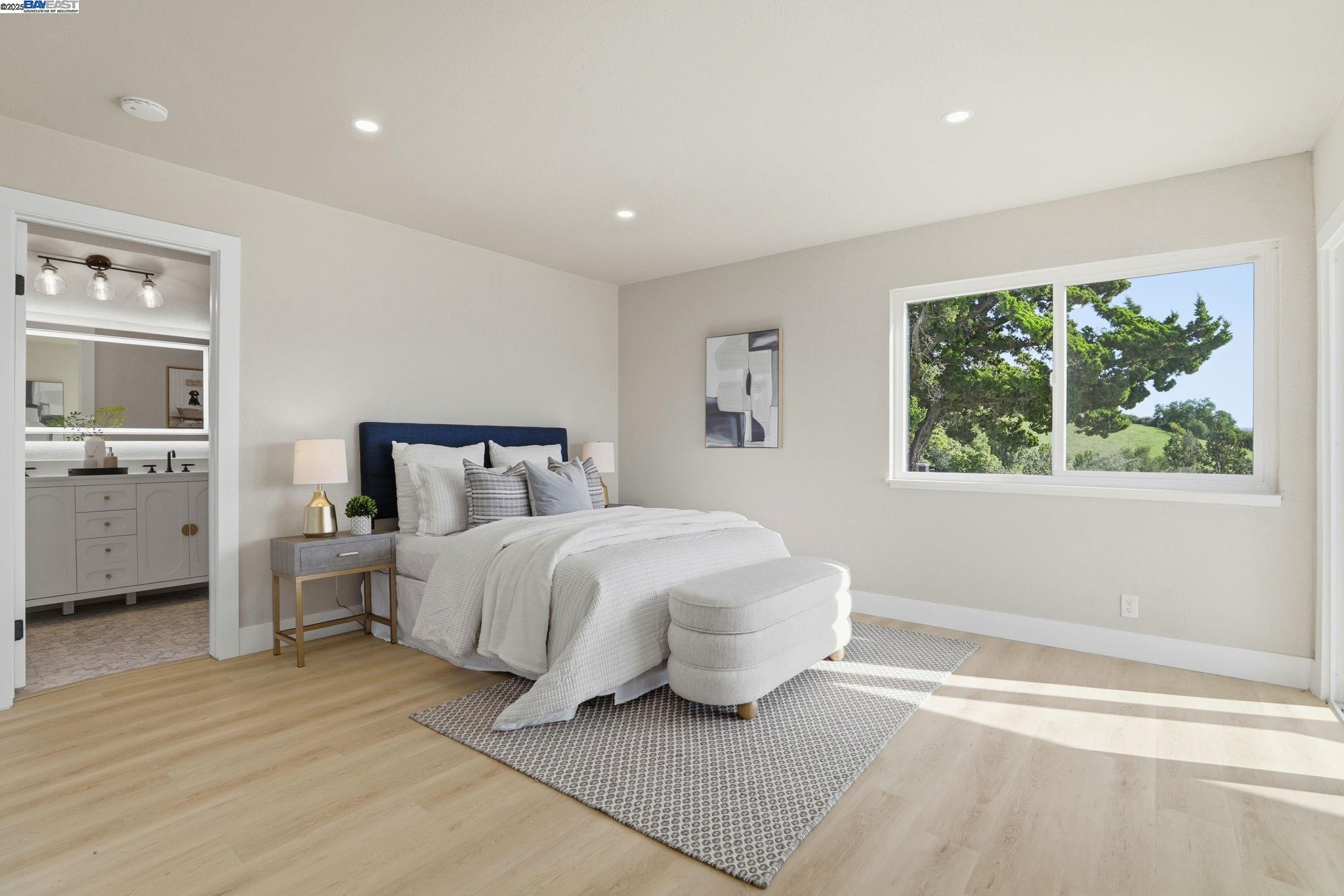 10745 Ridgeview Way San Jose, CA 95127 - Photo 25 of 54 a bedroom with a bed and a window