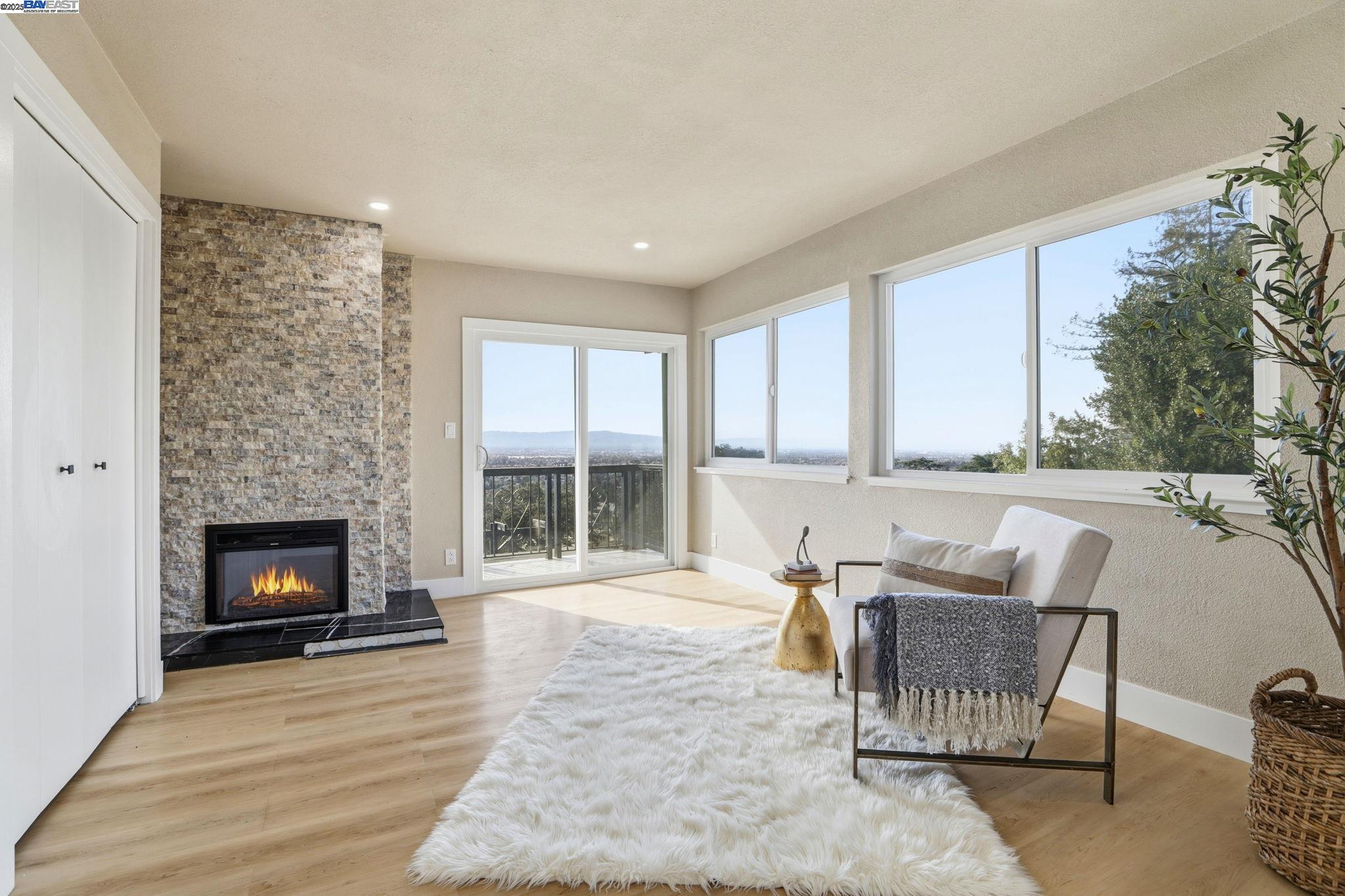 10745 Ridgeview Way San Jose, CA 95127 - Photo 31 of 54 a living room with furniture and a fireplace