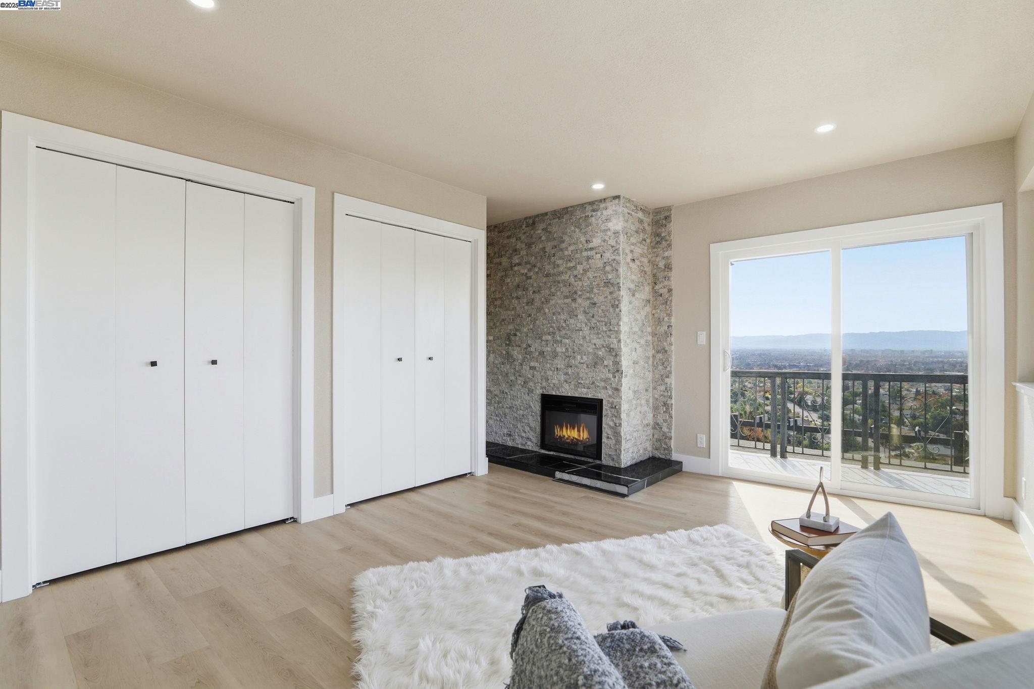 10745 Ridgeview Way San Jose, CA 95127 - Photo 32 of 54 a bedroom with a bed and a couch