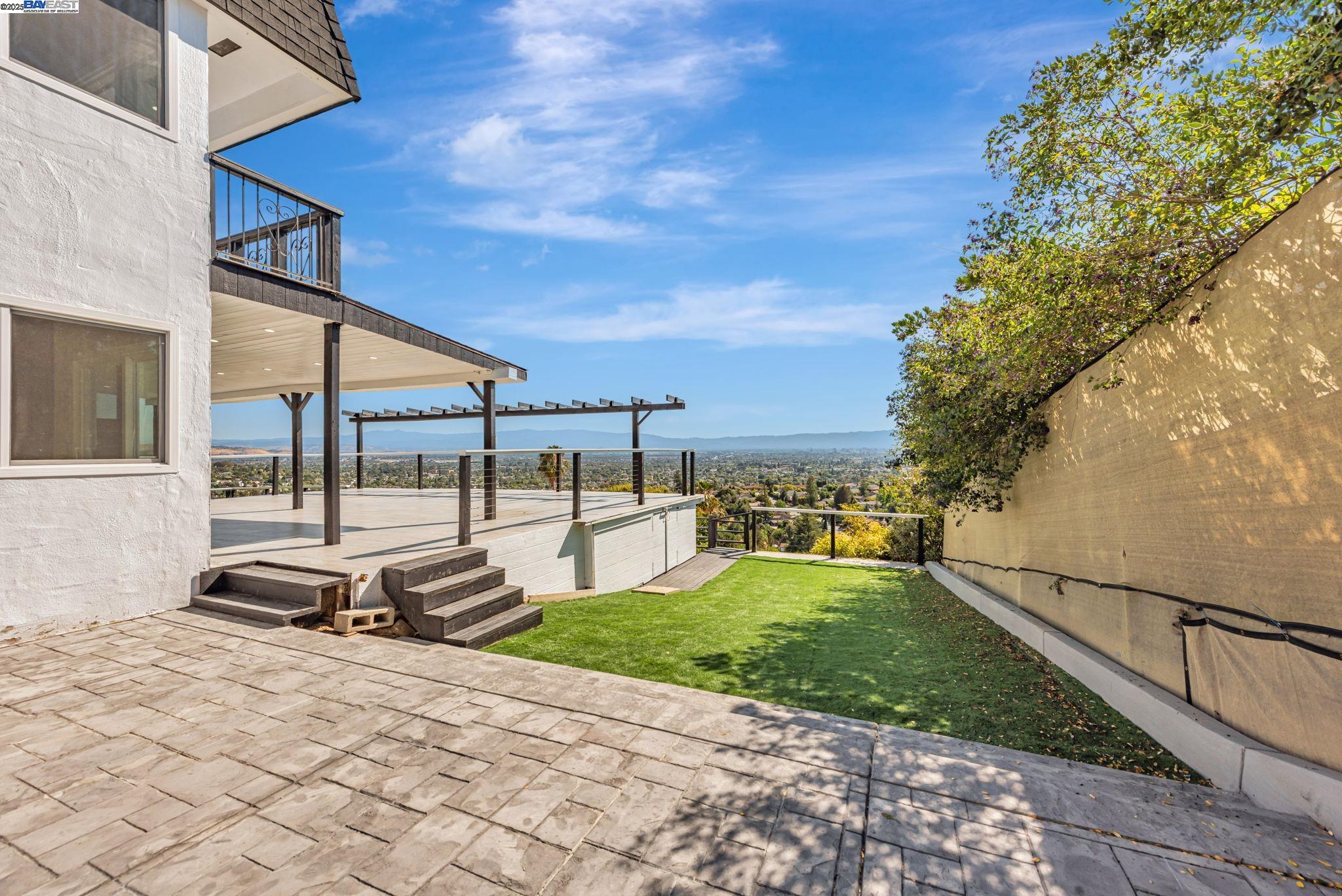 10745 Ridgeview Way San Jose, CA 95127 - Photo 44 of 54 a view of a swimming pool with a lounge chair