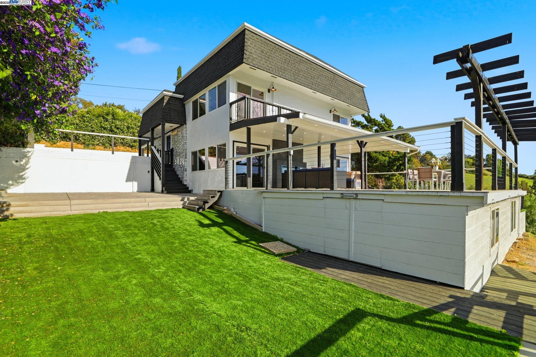 10745 Ridgeview Way San Jose, CA 95127 - Photo 45 of 54 a view of a house with a yard