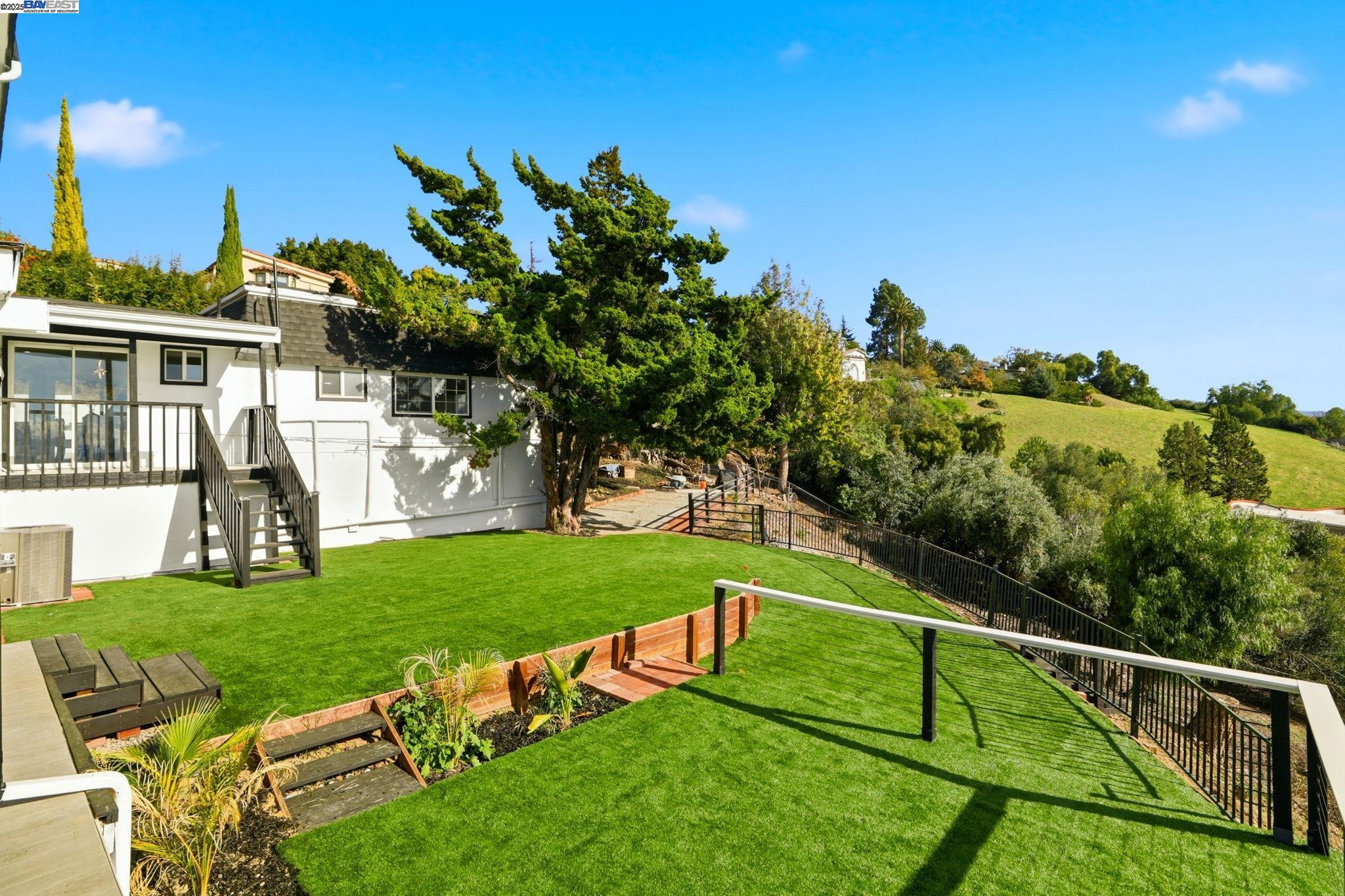 10745 Ridgeview Way San Jose, CA 95127 - Photo 46 of 54 a view of a house with a yard