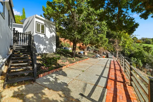 a view of a swimming pool with a chairs