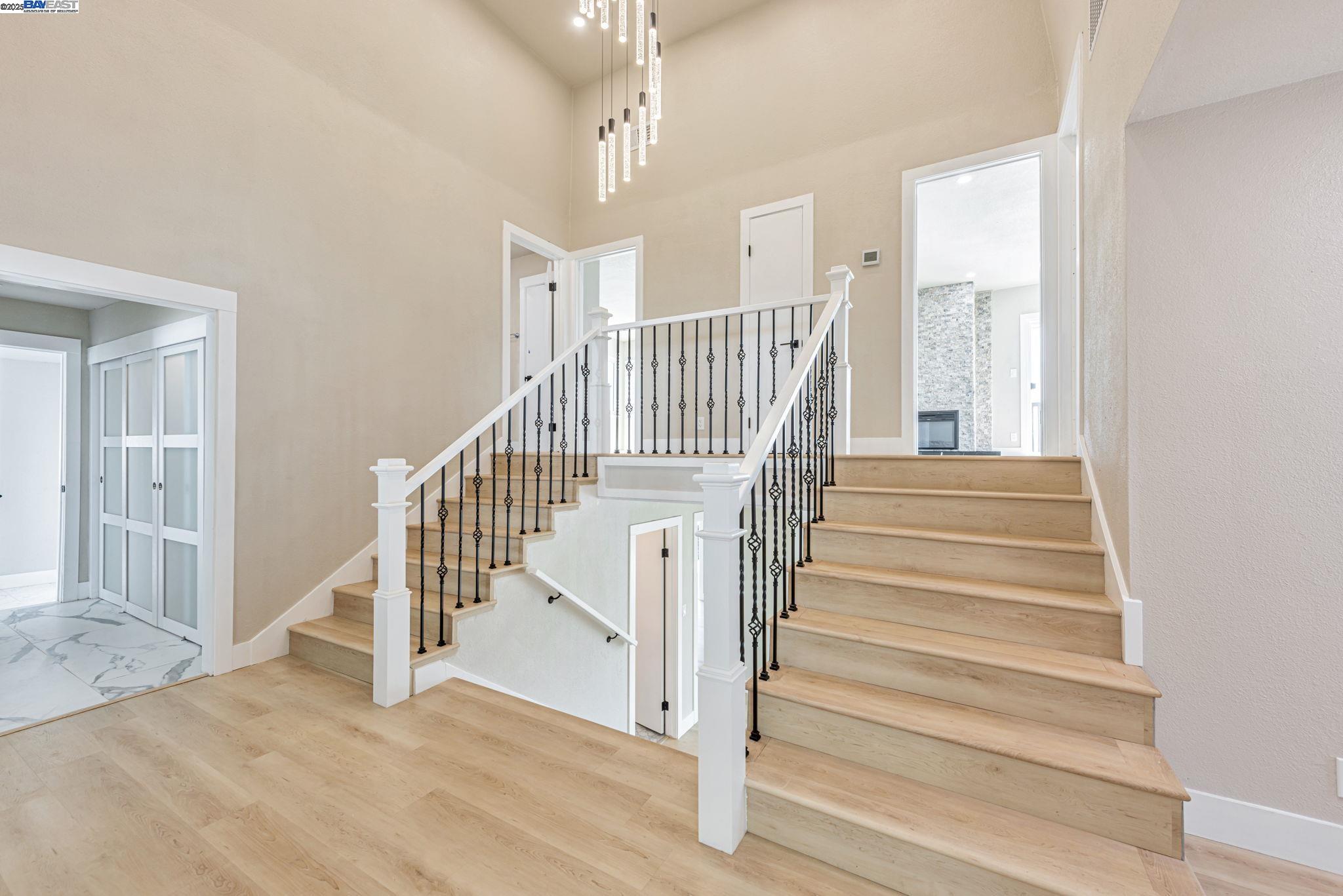 10745 Ridgeview Way San Jose, CA 95127 - Photo 5 of 54 a view of entryway and hall with wooden floor