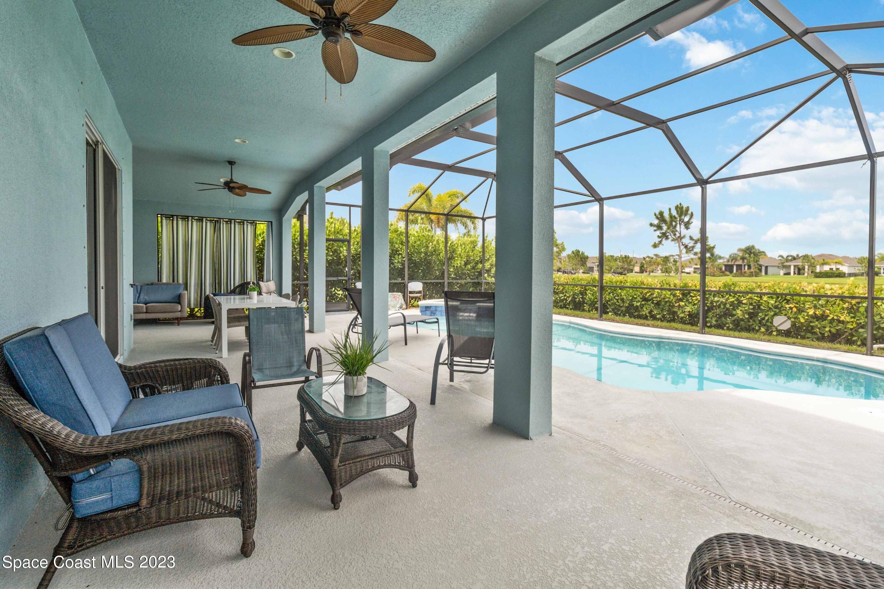 4215 Ruthann Circle Melbourne, FL 32934 - Photo 24 of 41 a living room with furniture and a large window
