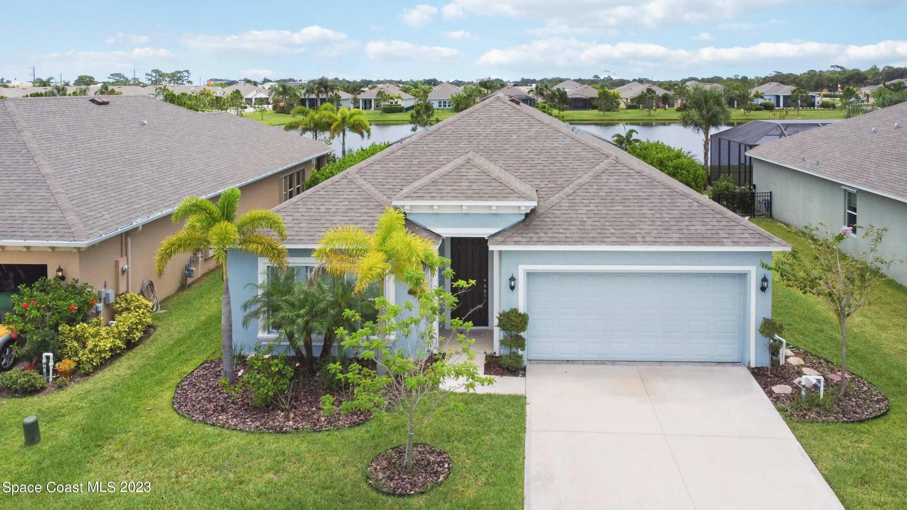 4215 Ruthann Circle Melbourne, FL 32934 - Photo 32 of 41 a view of a garden with an outdoor space