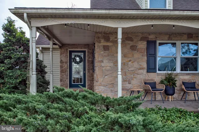 a front view of a house with patio