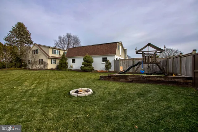 a view of a garden with houses
