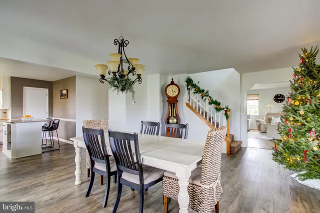 a kitchen with stainless steel appliances granite countertop a stove and a sink