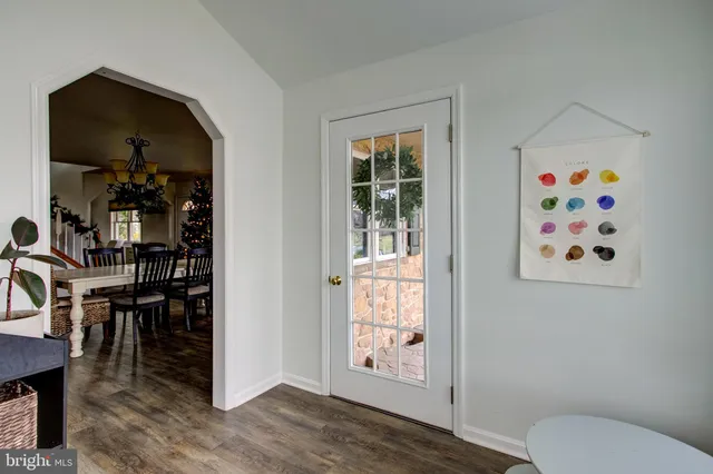 a bathroom with a sink a vanity and a window