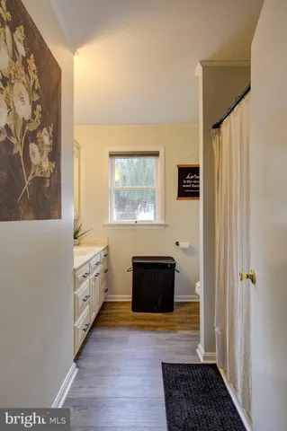 a view of staircase with white walls