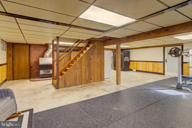 a bed room with a bed and a couch