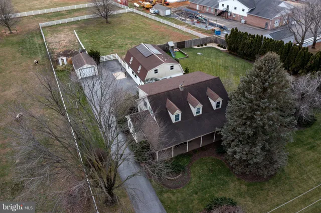 a front view of a house with garage