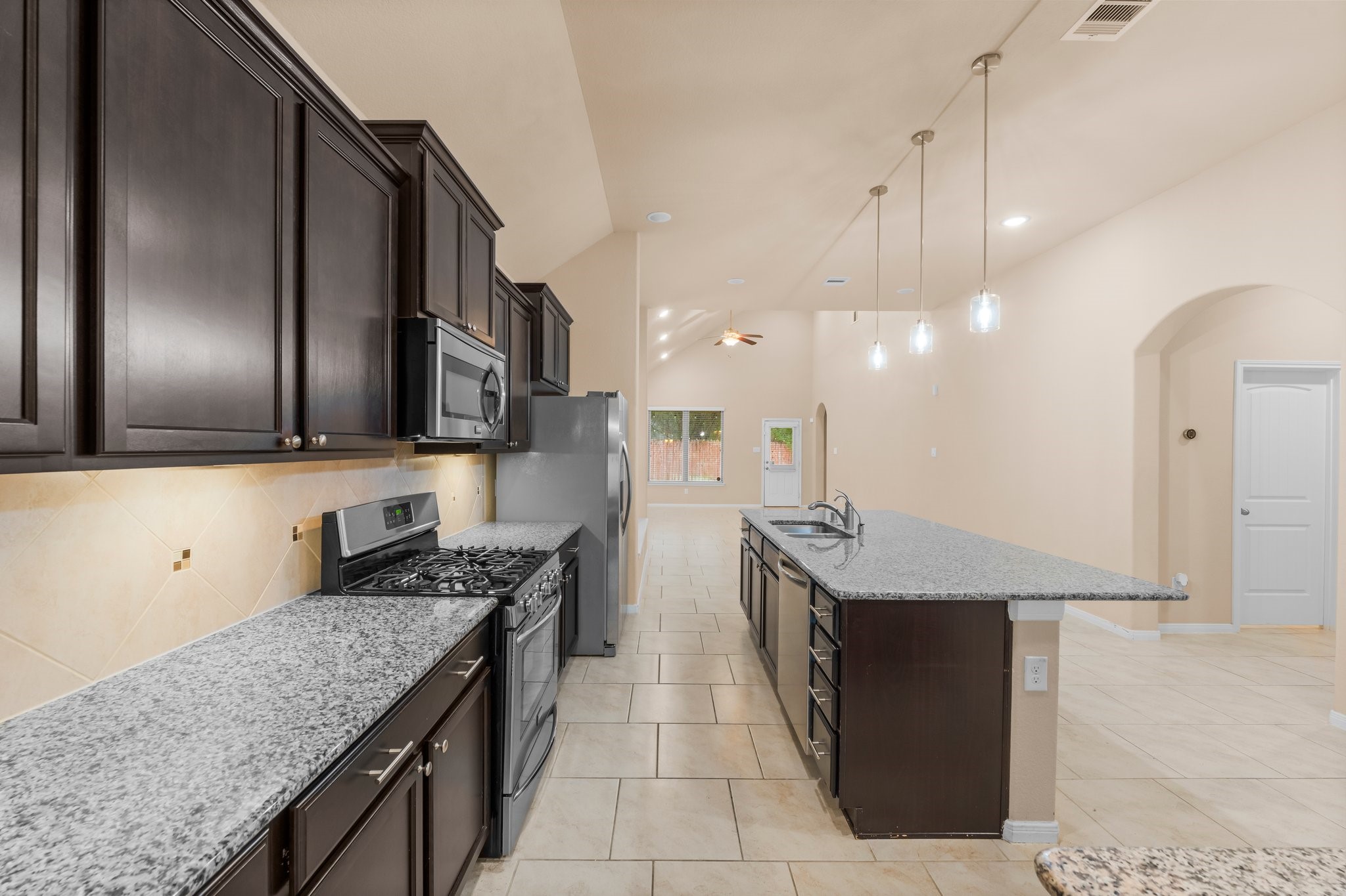 22314 Forbes Field Trail Spring, TX 77389 - Photo 8 of 46 Gorgeous Kitchen with large island is warm and welcoming.