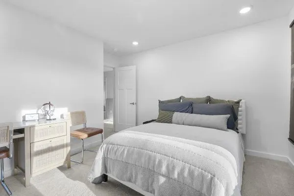 a utility room with sink dryer and washer