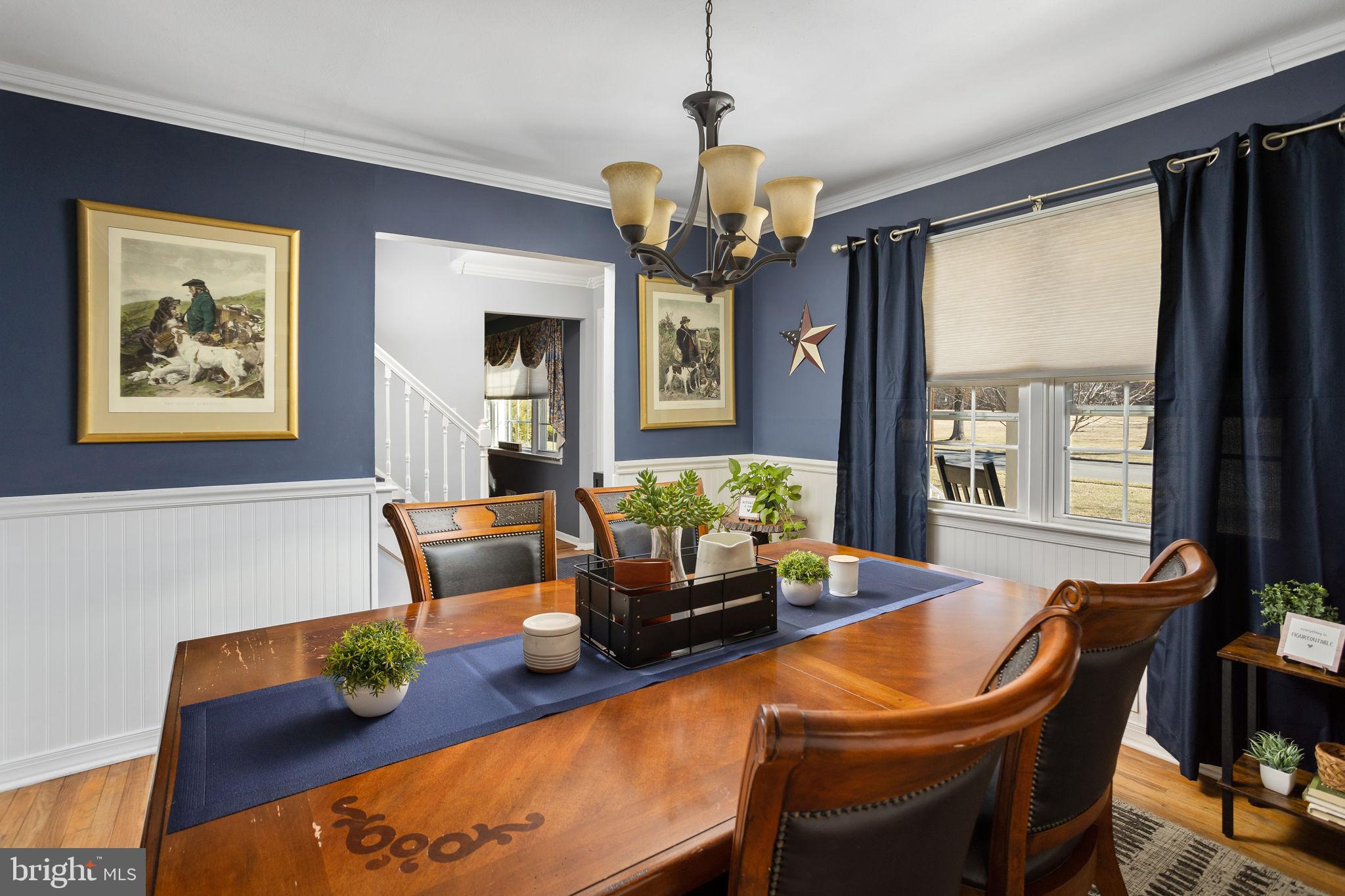 9 Sabrina Drive Ewing, NJ 08618 - Photo 11 of 49 a living room with furniture and a chandelier