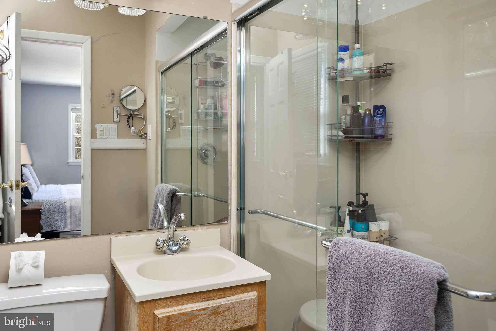 9 Sabrina Drive Ewing, NJ 08618 - Photo 31 of 49 a bathroom with a sink a toilet and shower