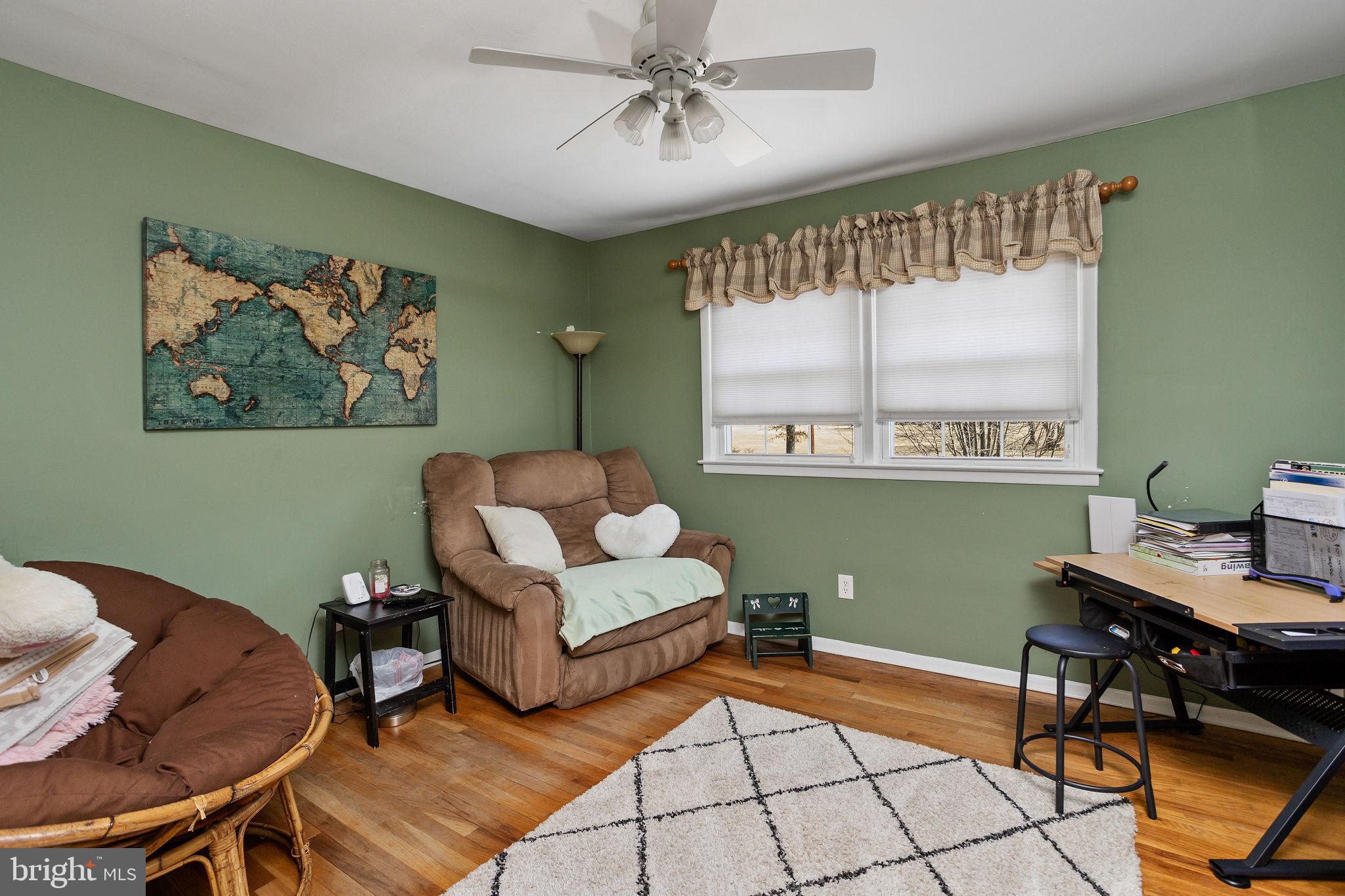 9 Sabrina Drive Ewing, NJ 08618 - Photo 36 of 49 a living room with furniture a table and a window