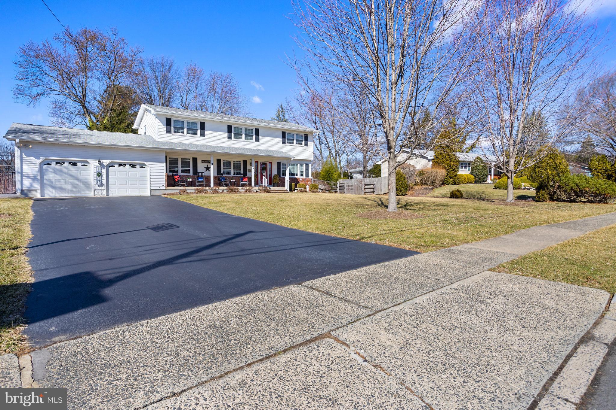 9 Sabrina Drive Ewing, NJ 08618 - Photo 47 of 49 a view of a building with trees in the background