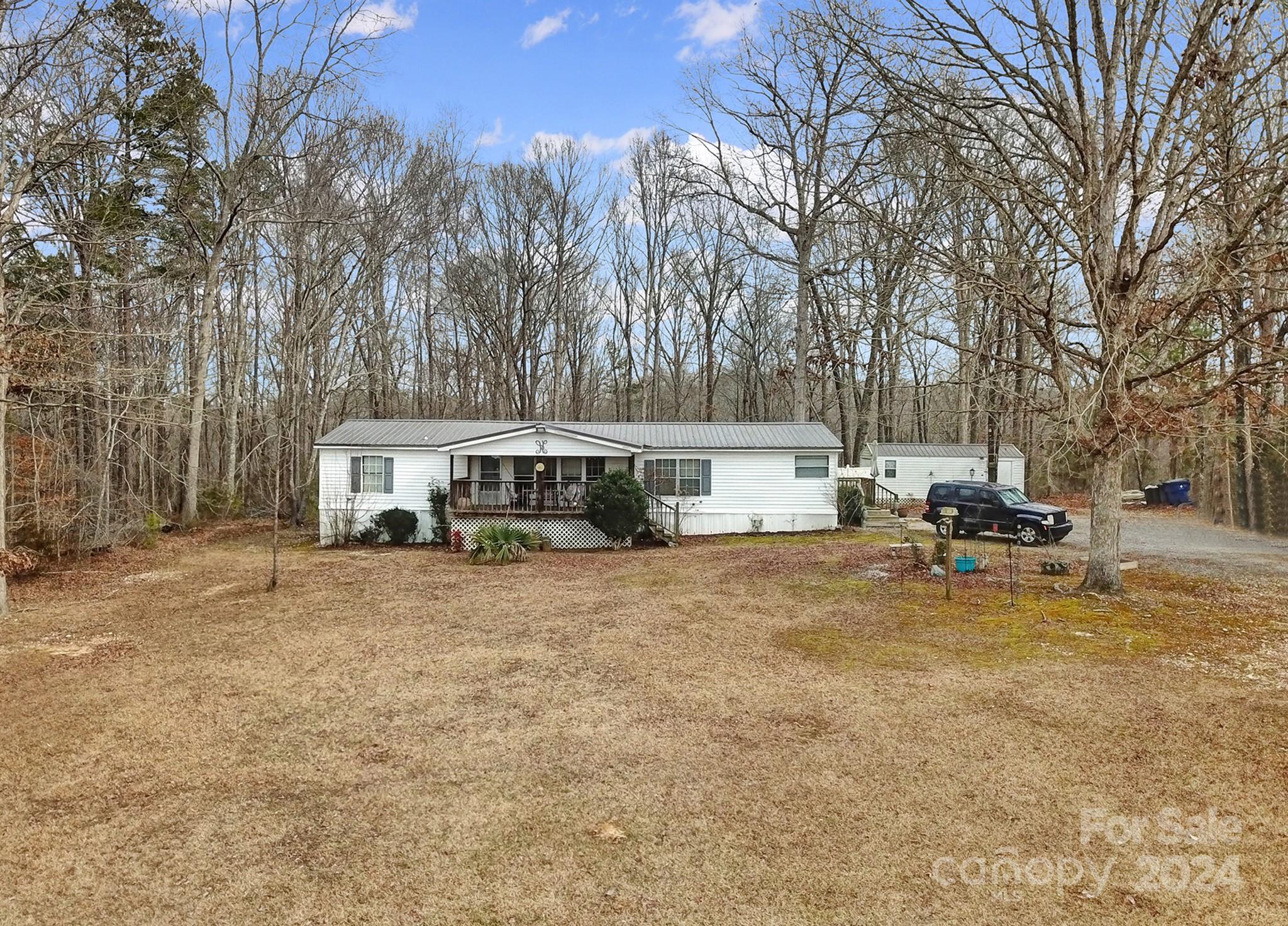 1950 Knight Road Lancaster, SC 29720 - Photo 2 of 24 a view of a house with swimming pool and sitting area